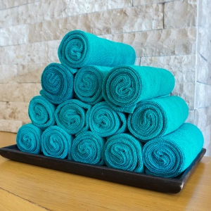 Towels Teal Colored In A Pyramid Stack 300X300