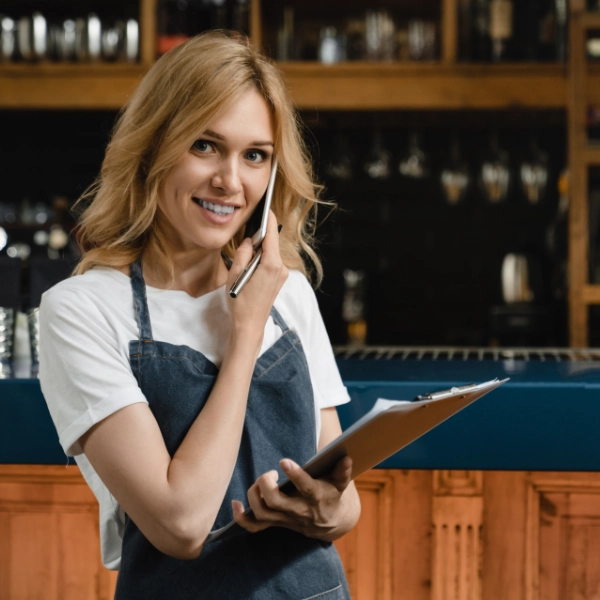 Restaurant Worker On The Phone 600X600